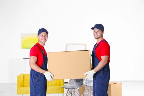 Office relocation support with equipment and boxes in Balham