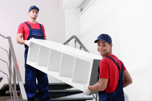 Packed boxes and secured items inside a moving truck