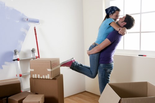 Professional man with van moving household items in South London