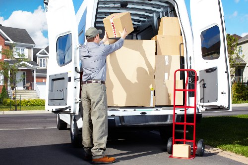 Careful packing of business equipment during a Balham move