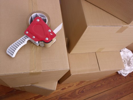 Loading furniture into a van for a Balham relocation